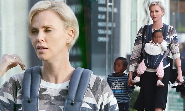 Charlize Theron enjoys some quality time with her children at music ...